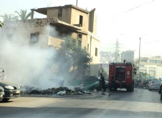 Incendie d'une poubelle dans la banlieue de Beyrouth. Crédit Photo: François el Bacha, tous droits réservés.