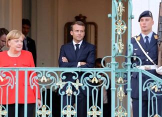 Angela Merkel et Emmanuel Macron à Mesberg (Allemagne), le 19 juin 2018. Ludovic Marin/AFP