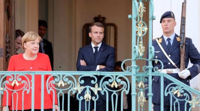 Angela Merkel et Emmanuel Macron à Mesberg (Allemagne), le 19 juin 2018. Ludovic Marin/AFP