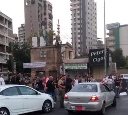 Des hommes en armes à Sin el Fil dans la banlieue de Beyrouth