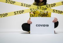 woman holding sign