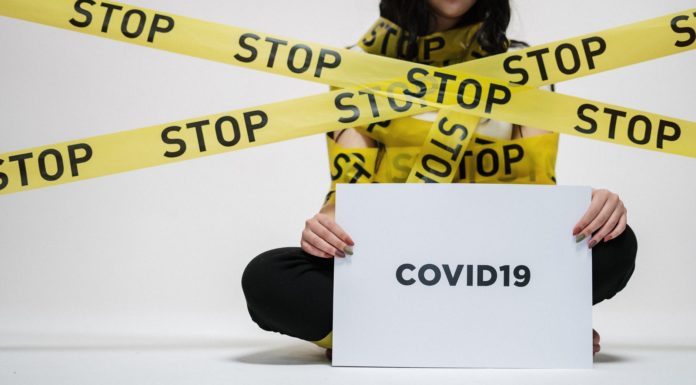 woman holding sign