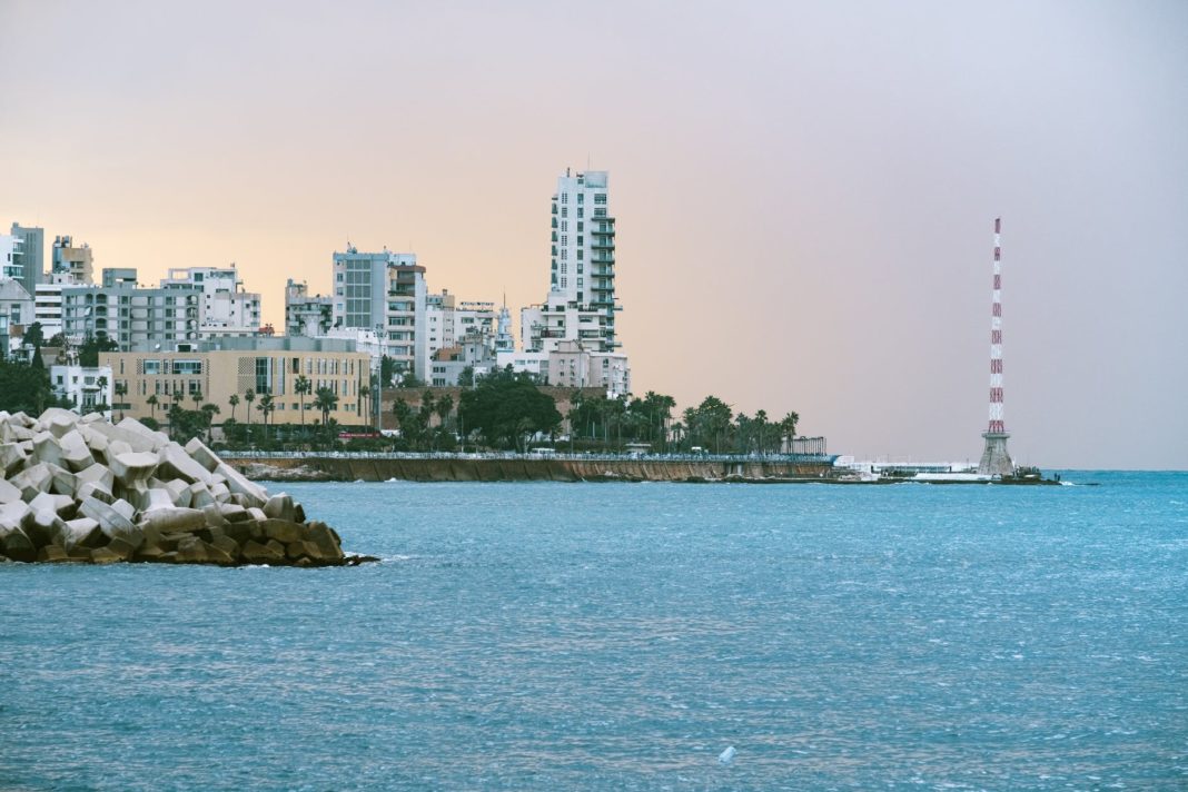 city skyline across body of water