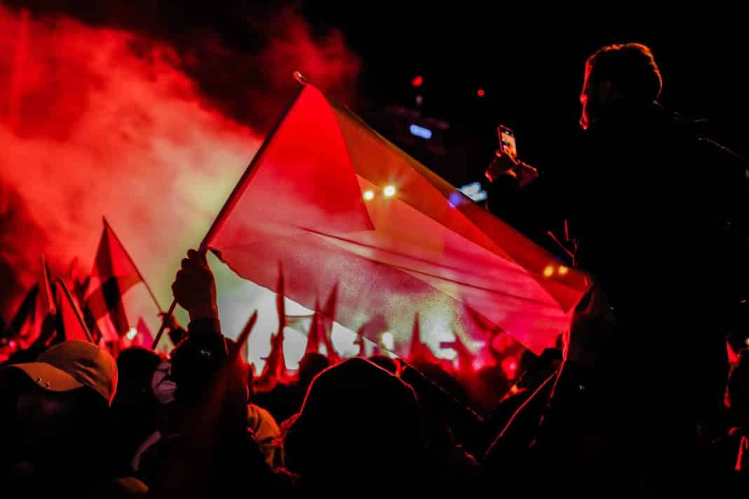 people gathering in a concert during night time