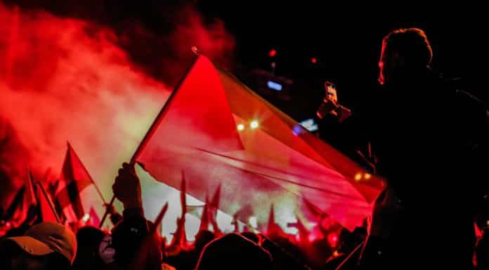 people gathering in a concert during night time