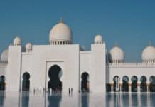view of mosque in city against clear sky
