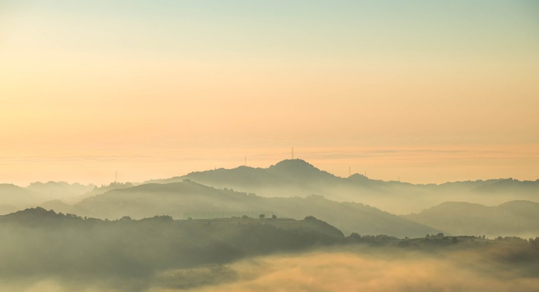 view of foggy mountains