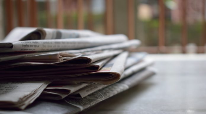 selective focus photography of magazines