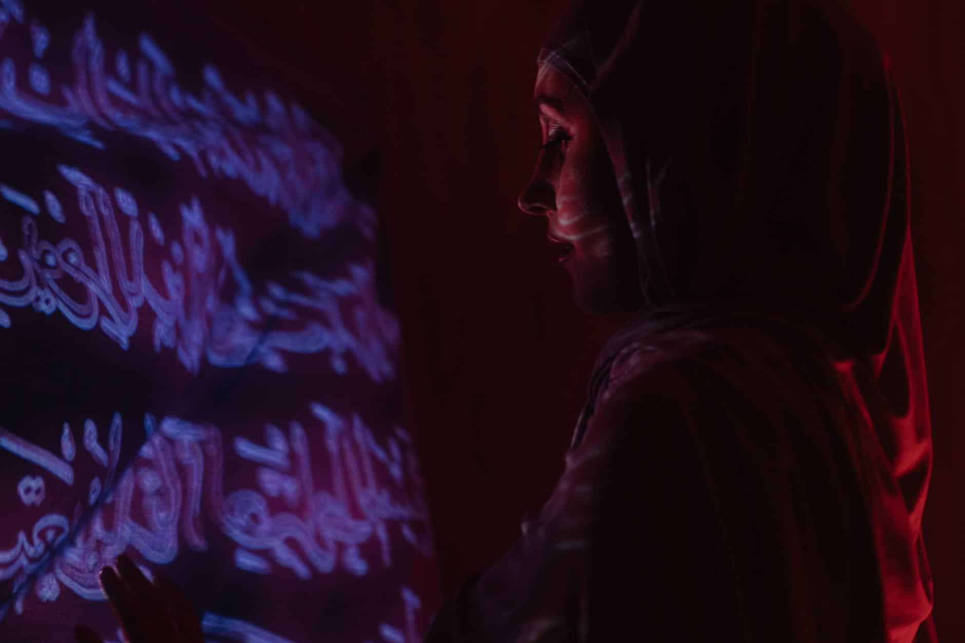 woman in black and white shirt