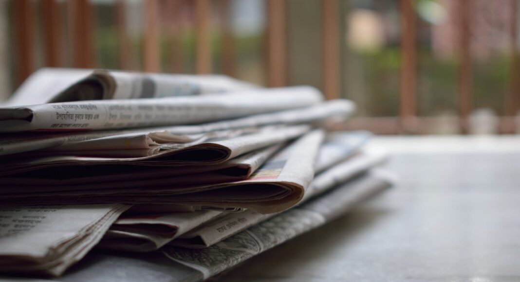 selective focus photography of magazines