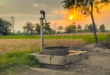 vintage water pump on a farmland