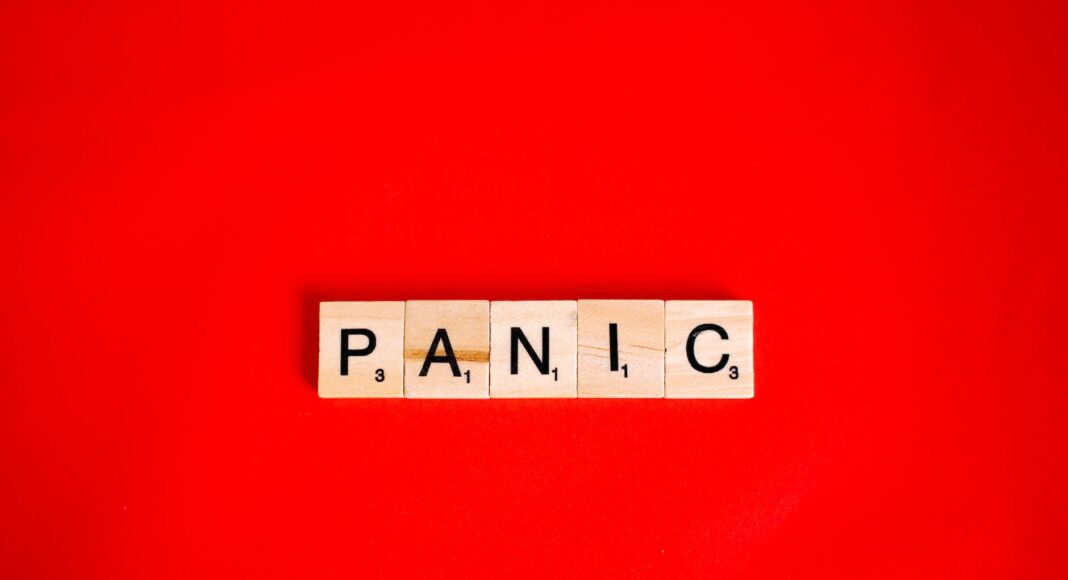 scrabbled tiles on red surface