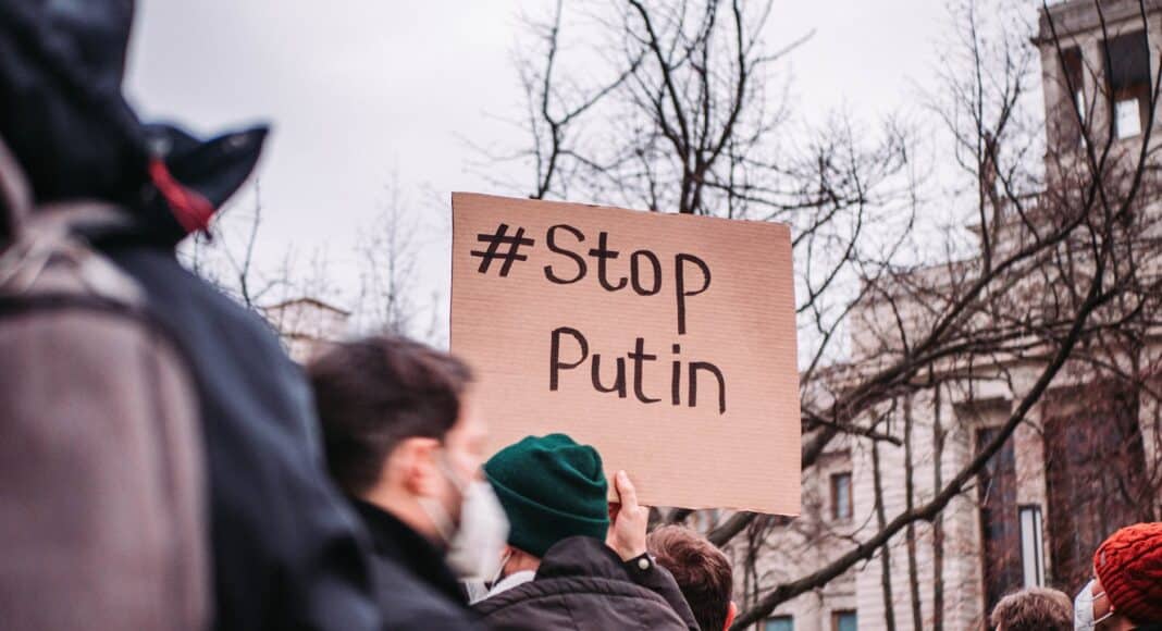 people in the street protesting against war