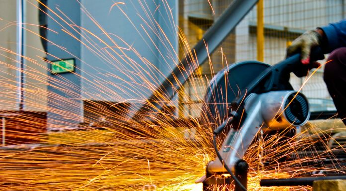 cut off saw cutting metal with sparks
