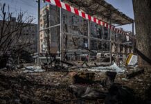 devastated bus stop in town after bomb explosion