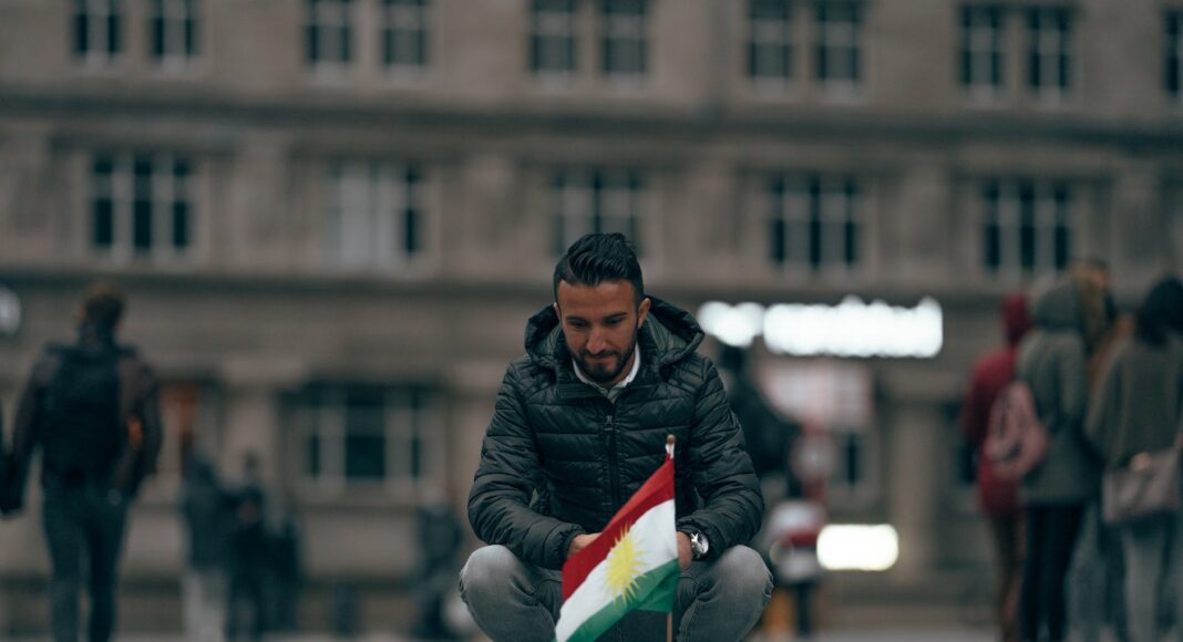 man on city square near memorial