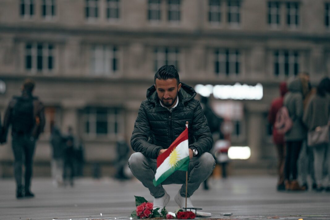 man on city square near memorial