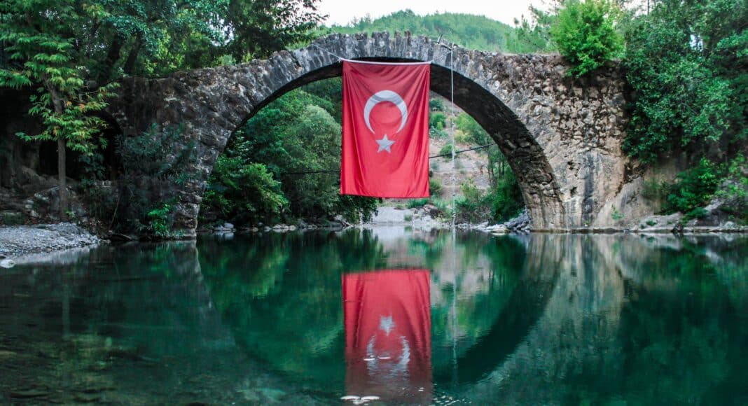 turkey flag hanging on bridge