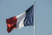 french flag against blue sky