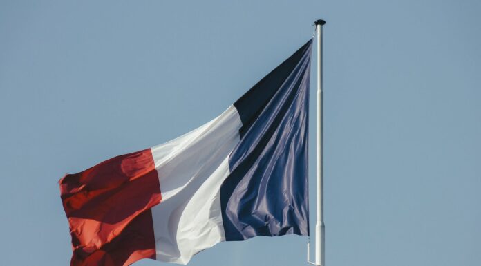 french flag against blue sky