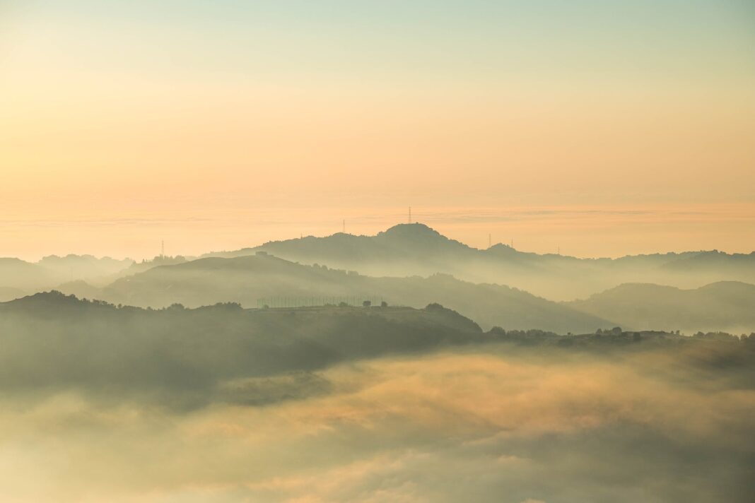 view of foggy mountains