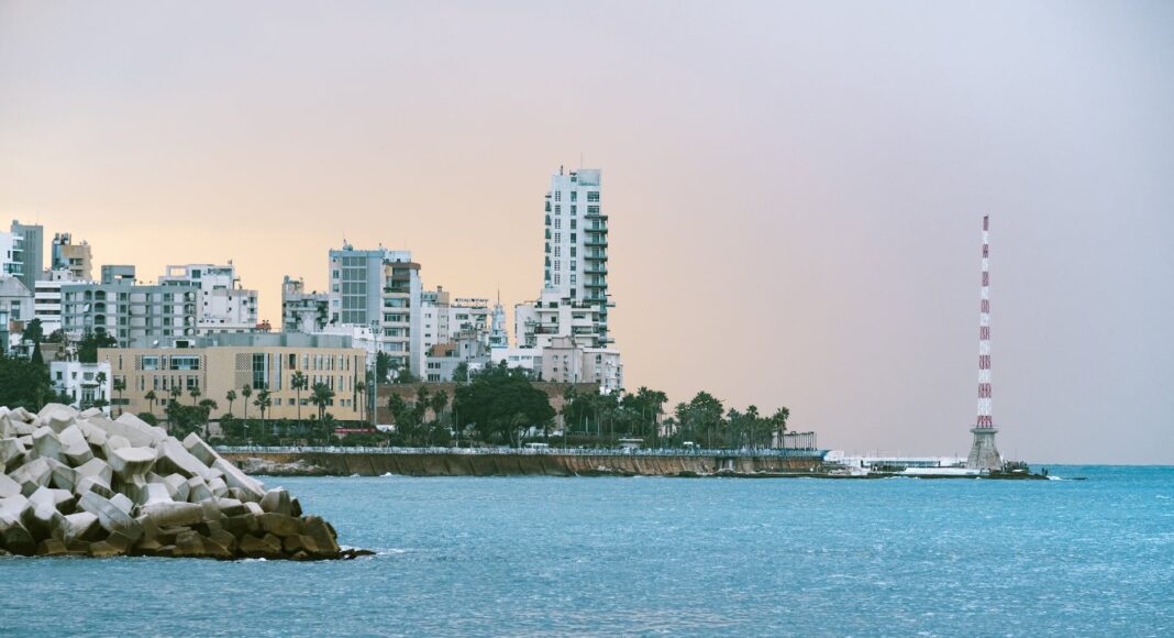 city skyline across body of water