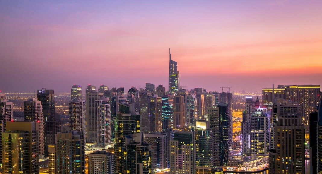 aerial view of city lit up at night