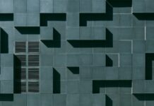 gray concrete building exterior with geometric design