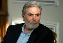 A picture of Ziyad al-Nakhleh in a meeting with Hossein Amirabdollahian, Minister of Foreign Affairs of Iran