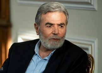 A picture of Ziyad al-Nakhleh in a meeting with Hossein Amirabdollahian, Minister of Foreign Affairs of Iran