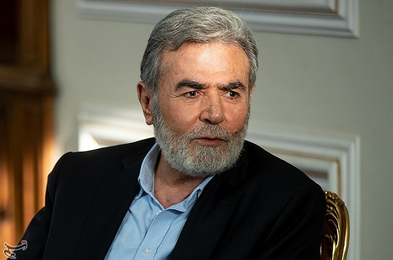 A picture of Ziyad al-Nakhleh in a meeting with Hossein Amirabdollahian, Minister of Foreign Affairs of Iran