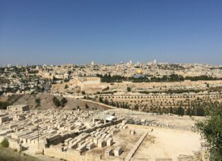 ancient city with old buildings on sunny day