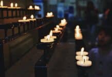 white tealight candles lit during nighttime