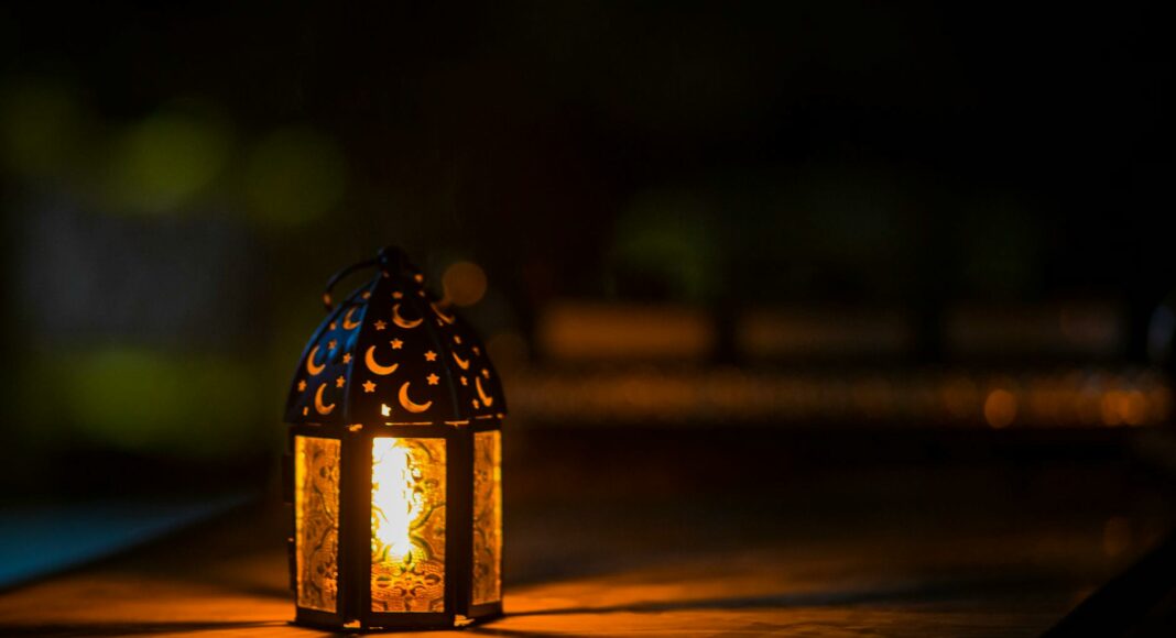 photo of ramadan light on top of table