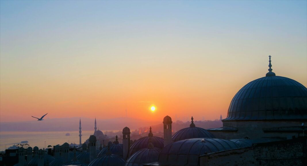 concrete dome buildings during golden hour