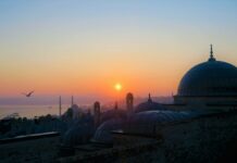 concrete dome buildings during golden hour
