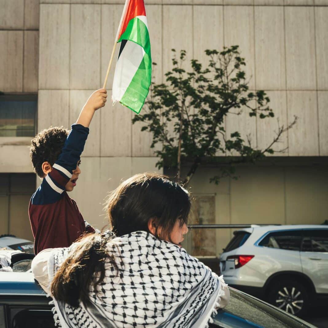 a kid holding a flag