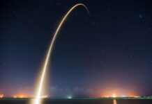 rocket launch liftoff long exposure