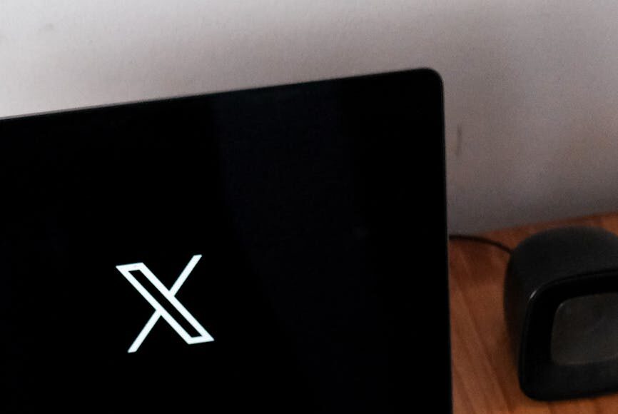 laptop with social media icon on desk