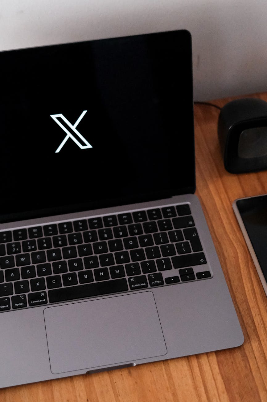 laptop with social media icon on desk