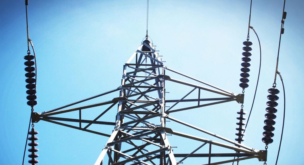 low angle view of electric post