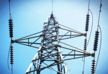 low angle view of electric post