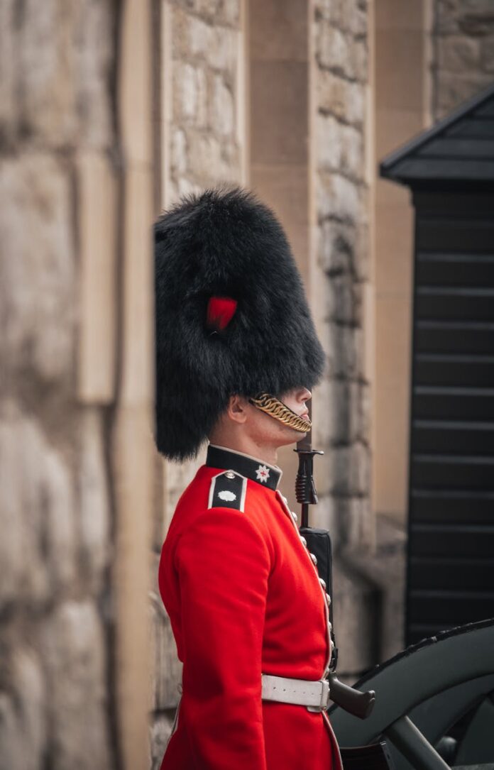 pexels-photo-14558667 person in red coat wearing black hat