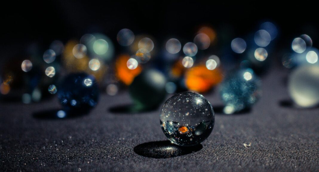selective focus photography of marble ball