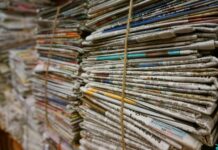shallow focus photography of magazines