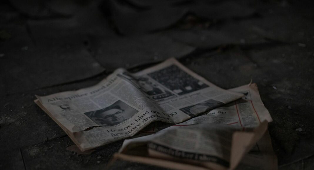 newspaper article on pavement