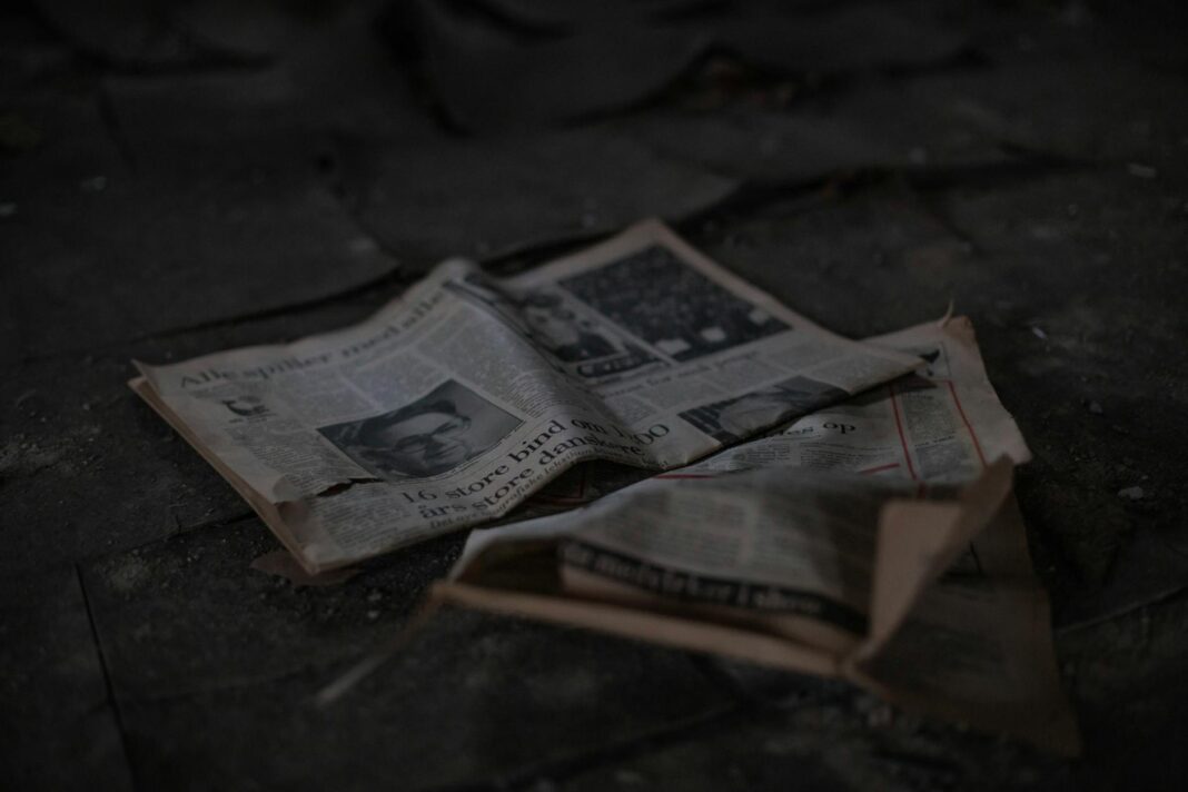 newspaper article on pavement