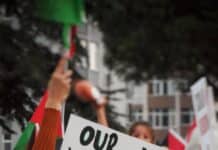 anti war banner at protest about palestine