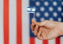 crop person showing handmade flag of israel