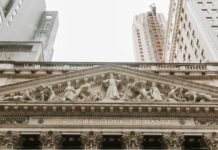 reliefs on wall of new york stock exchange building